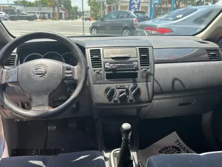 2009 Nissan Versa S with VIN 3N1BC13E19L499018, listed as a Copart auction lot 56711385 with 196,451 mi miles and Clean Title. Bid and sale history available at DreamBid. Image 9.