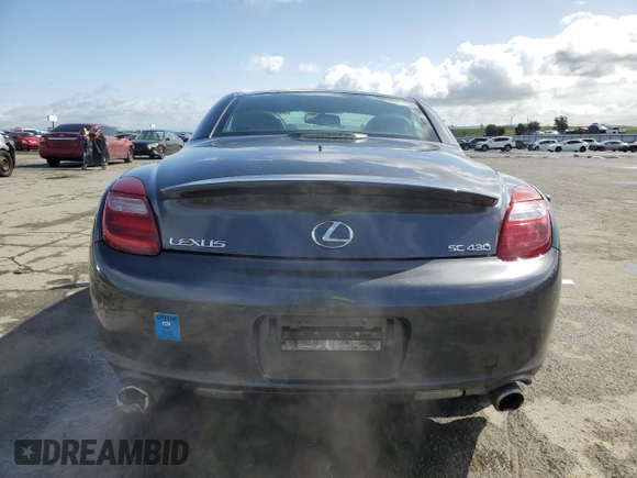 2006 Lexus SC 430 with VIN JTHFN48Y469003113, listed as a Copart auction lot 49112775 with 59,639 mi miles and Salvage title. Bid and sale history available at DreamBid. Image 6.