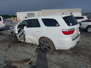 2013 Dodge Durango R/T with VIN 1C4SDHCT4DC648639, listed as a IAAI auction lot 42504044 with 193,909 mi miles and . Bid and sale history available at DreamBid. Image 3.