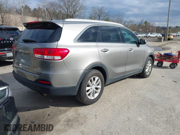 2016 Kia Sorento LX with VIN 5XYPGDA54GG177571, listed as a IAAI auction lot 41889298 with 140,702 mi miles. Bid and sale history available at carsss.com. Image 4.