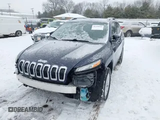 2014 Jeep Cherokee Altitude with VIN 1C4PJMCB9EW187288, listed as a IAAI auction lot 41320161 with 169,534 mi miles and . Bid and sale history available at DreamBid. Image 2.