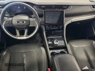 2023 Jeep Grand Cherokee Limited with VIN 1C4RJHBG3PC512146, listed as a IAAI auction lot 42853856 with 66,295 mi miles and . Bid and sale history available at DreamBid. Image 14.