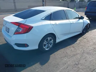 2018 Honda Civic LX with VIN 2HGFC2F56JH502770, listed as a IAAI auction lot 42117291 with 60,651 mi miles and . Bid and sale history available at DreamBid. Image 4.