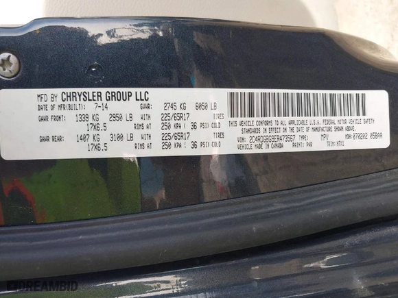 2014 Dodge Grand Caravan SE with VIN 2C4RDGBG9ER473567, listed as a IAAI auction lot 41800380 with 116,210 mi miles. Bid and sale history available at carsss.com. Image 9.