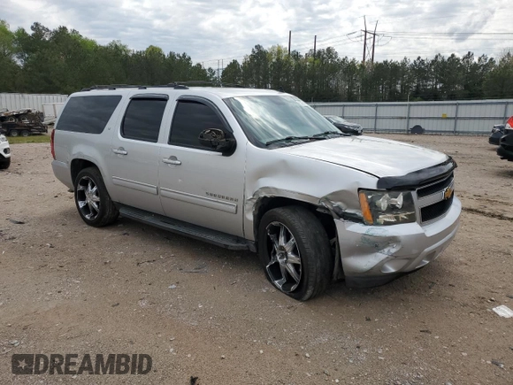 2014 Chevrolet Suburban LT z VIN 1GNSCJE00ER157634, wystawiony jako Copart lot #53271405 z przebiegiem 244 830 mil mil oraz Czysty tytuł • Clean title. Historia ofert i sprzedaży dostępna na DreamBid. Obrazek 4.