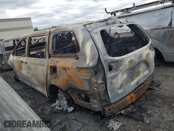 2013 Toyota Sienna XLE AAS with VIN 5TDYK3DC2DS333581, listed as a Copart auction lot 57325635 with Not provided miles and Non repairable. Bid and sale history available at DreamBid. Image 2.