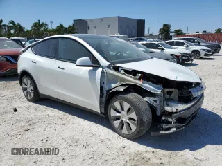 2023 Tesla Model Y Long Range with VIN 7SAYGDEEXPF770800, listed as a Copart auction lot 48324515 with 25,205 mi miles and Salvage Title. Bid and sale history available at DreamBid. Image 4.