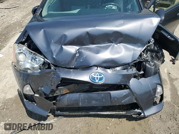 2012 Toyota Prius One z VIN JTDKDTB39C1028254, wystawiony jako Copart lot #59550425 z przebiegiem Nie podano mil oraz Nie do naprawy • Non repairable. Historia ofert i sprzedaży dostępna na DreamBid. Obrazek 11.