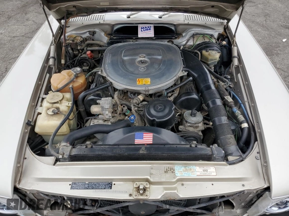 1987 Mercedes-Benz 560 SL z VIN WDBBA48D6HA070949, wystawiony jako Copart lot #75353644 z przebiegiem 114 792 mil mil oraz Czysty tytuł • Clean title. Historia ofert i sprzedaży dostępna na DreamBid. Obrazek 11.