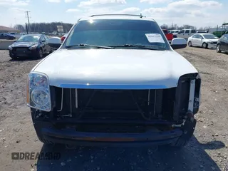 2009 GMC Yukon SLT w/4SA with VIN 1GKFK33059R282974, listed as a IAAI auction lot 42013219 with 209,240 mi miles. Bid and sale history available at carsss.com. Image 6.