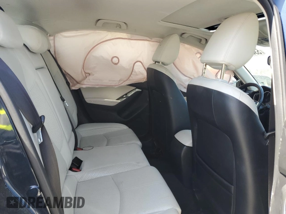 2017 Mazda 3 Grand Touring z VIN JM1BN1M3XH1117241, wystawiony jako Copart lot #53499295 z przebiegiem 63 886 mil mil oraz Szkoda całkowita • Salvage title. Historia ofert i sprzedaży dostępna na DreamBid. Obrazek 10.
