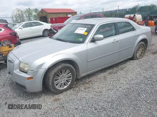 2008 Chrysler 300 Touring with VIN 2C3KA53G48H309834, listed as a IAAI auction lot 42200833 with 209,198 mi miles. Bid and sale history available at carsss.com. Image 2.