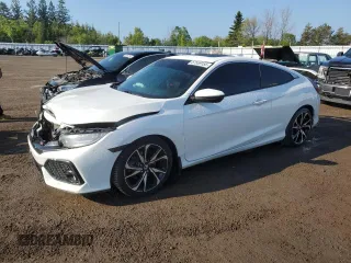 2019 Honda Civic Si z VIN 2HGFC3A59KH220203, wystawiony jako Copart lot #57559155 z przebiegiem 127 709 mil mil oraz Szkoda całkowita • Salvage title. Historia ofert i sprzedaży dostępna na DreamBid. Obrazek 1.