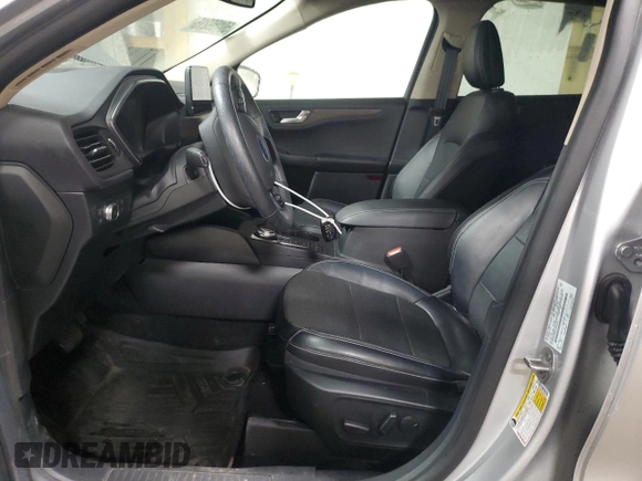 2020 Ford Escape Titanium Hybrid z VIN 1FMCU9DZ6LUB39475, wystawiony jako Copart lot #50159215 z przebiegiem 76 496 mil mil oraz Szkoda całkowita • Salvage title. Historia ofert i sprzedaży dostępna na DreamBid. Obrazek 7.