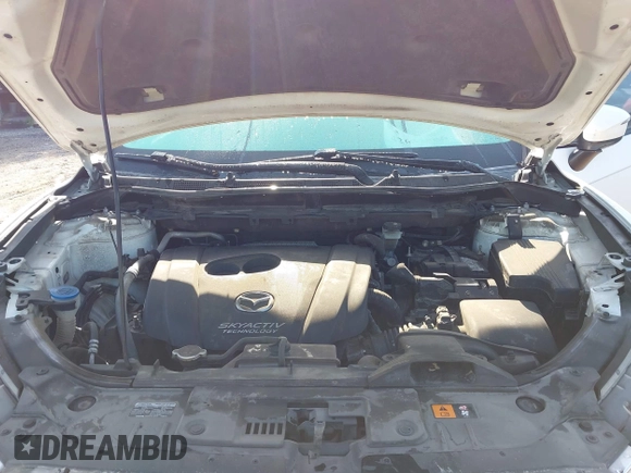 2015 Mazda CX-5 Sport with VIN JM3KE2BE6F0541469, listed as a IAAI auction lot 42632906 with 166,257 mi miles and . Bid and sale history available at DreamBid. Image 10.