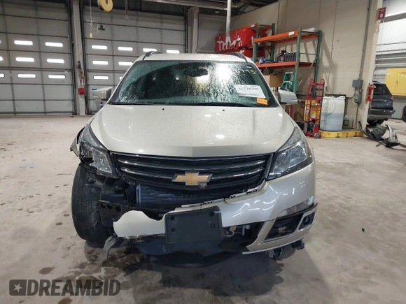 2015 Chevrolet Traverse LT with VIN 1GNKRHKDXFJ194964, listed as a IAAI auction lot 41728795 with 167,760 mi miles and . Bid and sale history available at DreamBid. Image 13.