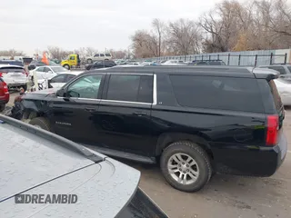 2019 Chevrolet Suburban LT with VIN 1GNSKHKC0KR159583, listed as a IAAI auction lot 41309350 with 196,844 mi miles. Bid and sale history available at carsss.com. Image 14.