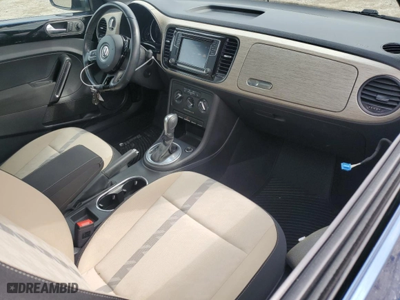 2018 Volkswagen Beetle S with VIN 3VWFD7AT2JM704700, listed as a Copart auction lot 74505314 with 63,092 mi miles and Salvage Title. Bid and sale history available at carsss.com. Image 8.