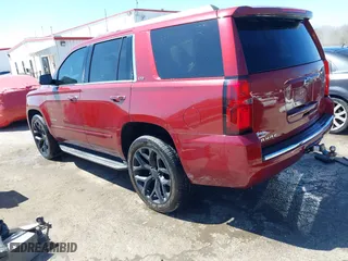 2016 Chevrolet Tahoe LTZ with VIN 1GNSKCKC9GR422695, listed as a IAAI auction lot 41880564 with 302,106 mi miles. Bid and sale history available at carsss.com. Image 3.