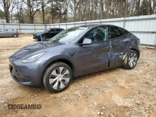 2023 Tesla Model Y Long Range z VIN 7SAYGDEE5PA164270, wystawiony jako Copart lot #50260835 z przebiegiem 17 340 mil mil oraz Szkoda całkowita • Salvage title. Historia ofert i sprzedaży dostępna na DreamBid. Obrazek 1.