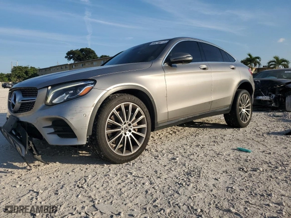 2019 Mercedes-Benz GLC with VIN WDC0J4KBXKF535110, listed as a Copart auction lot 43216615 with 105,050 mi miles and Salvage Title. Bid and sale history available at carsss.com. Image 1.