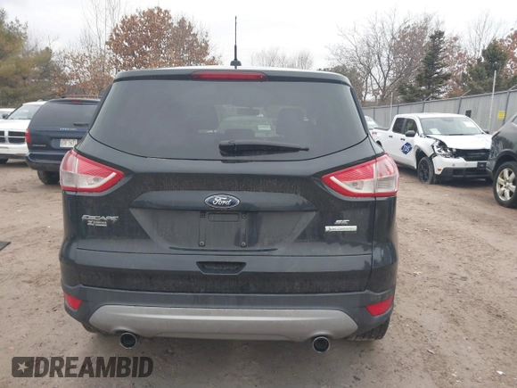 2013 Ford Escape SE with VIN 1FMCU0GX1DUD08065, listed as a IAAI auction lot 41721553 with 113,935 mi miles. Bid and sale history available at carsss.com. Image 17.
