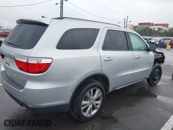 2013 Dodge Durango Crew z VIN 1C4RDJDGXDC637572, wystawiony jako IAAI lot #41922757 z przebiegiem 110 941 mil mil oraz . Historia ofert i sprzedaży dostępna na DreamBid. Obrazek 4.