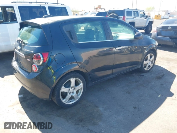2015 Chevrolet Sonic LTZ with VIN 1G1JE6SB8F4116693, listed as a IAAI auction lot 42865997 with 102,961 mi miles and . Bid and sale history available at DreamBid. Image 4.