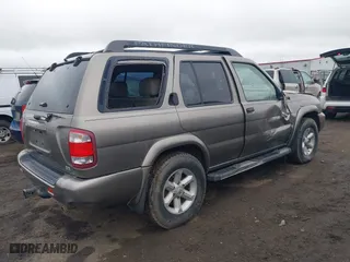 2004 Nissan Pathfinder SE with VIN JN8DR09Y84W903472, listed as a IAAI auction lot 41906953 with 229,758 mi miles. Bid and sale history available at carsss.com. Image 4.