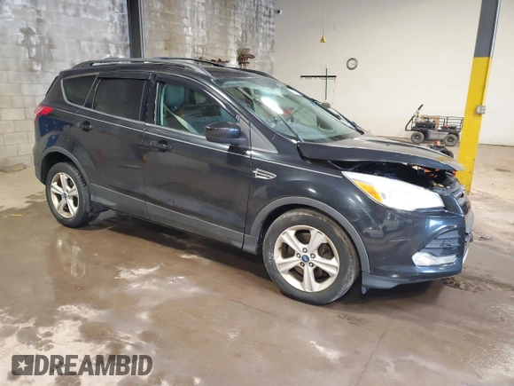 2013 Ford Escape SE with VIN 1FMCU9GX5DUA90541, listed as a Copart auction lot 58897585 with 124,593 mi miles and Salvage title. Bid and sale history available at DreamBid. Image 4.
