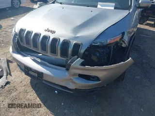 2016 Jeep Cherokee 75th Anniversary with VIN 1C4PJLCB5GW287420, listed as a IAAI auction lot 41984043 with 145,577 mi miles. Bid and sale history available at carsss.com. Image 6.