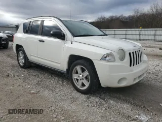 2009 Jeep Compass North with VIN 1J4FT47B49D196637, listed as a Copart auction lot 82918314 with 156,117 mi miles and Clean Title. Bid and sale history available at carsss.com. Image 4.