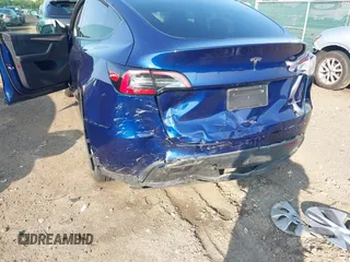 2023 Tesla Model Y Long Range with VIN 7SAYGDEE0PF671726, listed as a IAAI auction lot 42393616 with Not provided miles and . Bid and sale history available at DreamBid. Image 19.