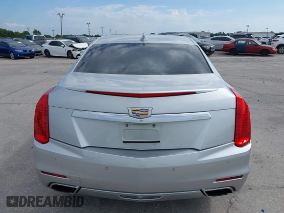 2016 Cadillac CTS with VIN 1G6AR5SS9G0194126, listed as a IAAI auction lot 41972437 with 129,742 mi miles and . Bid and sale history available at DreamBid. Image 16.