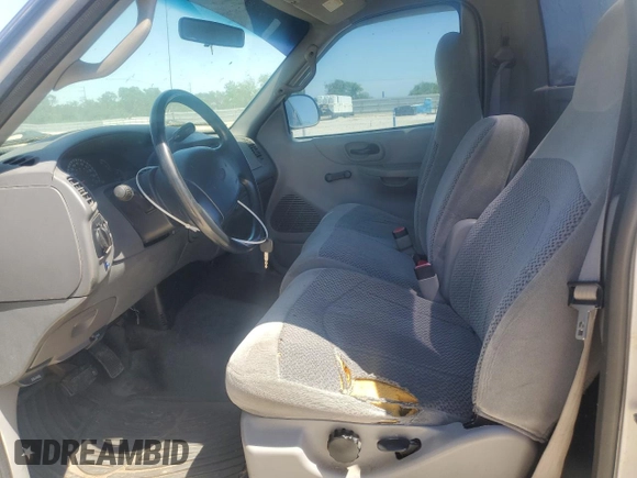 2000 Ford F-150 XL with VIN 1FTZF1722YKA51583, listed as a Copart auction lot 53860835 with 163,877 mi miles and Clean title. Bid and sale history available at DreamBid. Image 7.