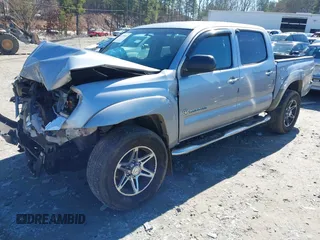 2014 Toyota Tacoma PreRunner with VIN 5TFJU4GNXEX061808, listed as a IAAI auction lot 41585931 with 214,240 mi miles. Bid and sale history available at carsss.com. Image 2.
