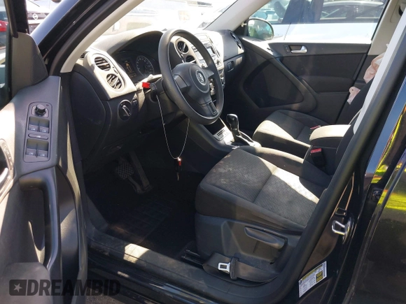 2012 Volkswagen Tiguan LE with VIN WVGAV7AX1CW557250, listed as a IAAI auction lot 42300694 with 122,310 mi miles and . Bid and sale history available at DreamBid. Image 5.