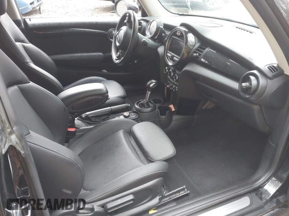 2019 MINI Hardtop Cooper S z VIN WMWXP7C54K2A53043, wystawiony jako IAAI lot #41794566 z przebiegiem 42 278 mil mil oraz . Historia ofert i sprzedaży dostępna na DreamBid. Obrazek 5.