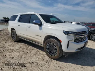 2021 Chevrolet Suburban Premier with VIN 1GNSKFKT4MR341875, listed as a Copart auction lot 54381194 with 66,731 mi miles and Salvage Title. Bid and sale history available at DreamBid. Image 4.
