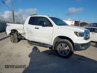 2013 Toyota Tundra z VIN 5TFRM5F1XDX054525, wystawiony jako IAAI lot #41843019 z przebiegiem 157 047 mil mil oraz . Historia ofert i sprzedaży dostępna na DreamBid. Obrazek 1.