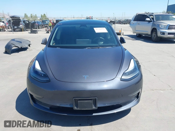 2023 Tesla Model 3 with VIN 5YJ3E1EAXPF405588, listed as a IAAI auction lot 42348952 with 30,788 mi miles and . Bid and sale history available at DreamBid. Image 13.