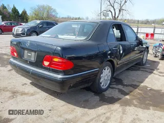 1998 Mercedes-Benz E-Class with VIN WDBJF65F1WA631361, listed as a IAAI auction lot 41870881 with 101,292 mi miles. Bid and sale history available at carsss.com. Image 4.