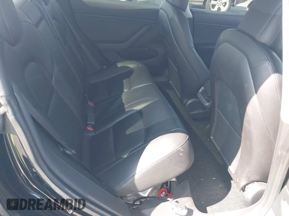 2019 Tesla Model 3 Mid Range with VIN 5YJ3E1EA0KF317058, listed as a IAAI auction lot 42025195 with 108,771 mi miles. Bid and sale history available at carsss.com. Image 8.