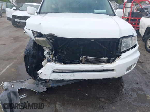 2014 Honda Ridgeline RTL with VIN 5FPYK1F58EB011186, listed as a IAAI auction lot 41903178 with 113,364 mi miles. Bid and sale history available at carsss.com. Image 6.