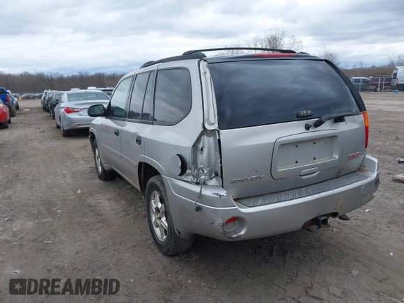 2008 GMC Envoy SLE2 with VIN 1GKDS13S982225326, listed as a IAAI auction lot 42046634 with 165,482 mi miles and . Bid and sale history available at DreamBid. Image 3.
