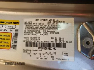 2017 Ford Mustang EcoBoost Premium with VIN 1FATP8UH3H5307982, listed as a Copart auction lot 57594895 with 58,955 mi miles and Salvage title. Bid and sale history available at DreamBid. Image 12.