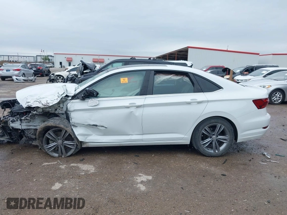 2021 Volkswagen Jetta S z VIN 3VWC57BUXMM017430, wystawiony jako IAAI lot #41947038 z przebiegiem 50 277 mil mil oraz . Historia ofert i sprzedaży dostępna na DreamBid. Obrazek 15.