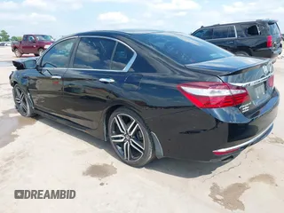 2016 Honda Accord Sport with VIN 1HGCR2F59GA060740, listed as a IAAI auction lot 42200371 with 140,679 mi miles and . Bid and sale history available at DreamBid. Image 3.