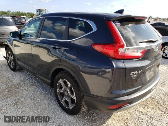 2018 Honda CR-V EX with VIN 7FARW1H57JE029448, listed as a Copart auction lot 70052882 with 57,388 mi miles. Bid and sale history available at carsss.com. Image 2.