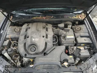 2008 Kia Amanti z VIN KNALD125185165602, wystawiony jako Copart lot #83548154 z przebiegiem 78 734 mil mil oraz Szkoda całkowita • Salvage title. Historia ofert i sprzedaży dostępna na DreamBid. Obrazek 11.